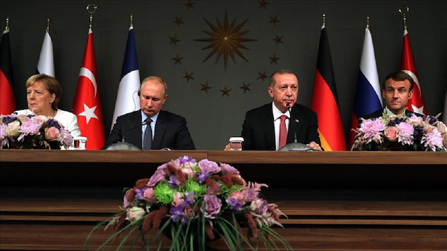 German Chancellor Angela Merkel, Russian President Vladimir Putin, Turkish President Recep Tayyip Erdoğan and French President Emmanuel Macron 