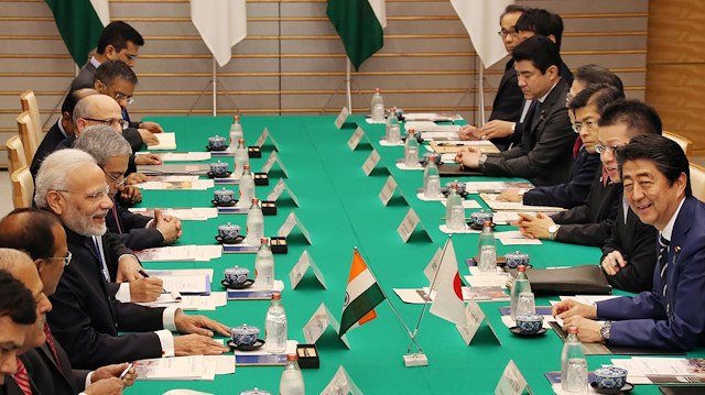 Indian Prime Minister Narendra Modi talks with Japan's Prime Minister Shinzo Abe during their meeting at Abe's official residence,Tokyo, Japan October 29, 2018. 