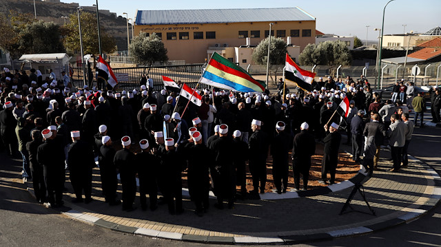 Druze Arabs on the Israeli-occupied Golan Heights hold an anti-election protest outside a municipal polling station in Majdal Shams, October 30, 2018.