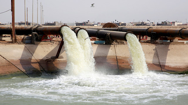 Water pours in Al Bida water tanks project in Basra, Iraq September 12, 2018.