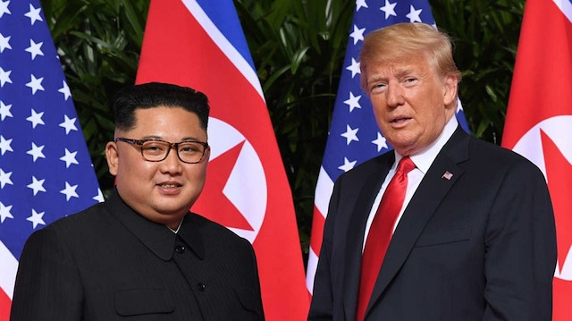 Kuzey Kore Devlet Başkanı Kim Jong Un ve ABD Devlet Başkanı Donald Trump 