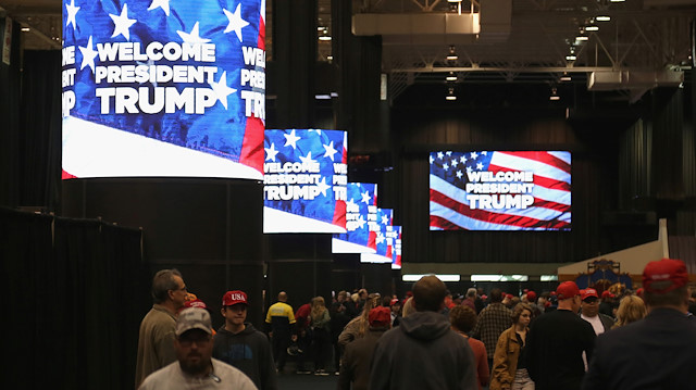 Supporters of U.S. President Donald Trump gather at his rally in support of Ohio Republican candidates on the eve of the U.S. midterm election in Cleveland, Ohio, U.S. November 5, 2018. 
