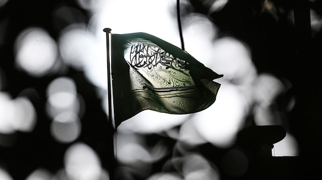 Saudi Arabia's flag waves atop the consulate in Istanbul, where journalist Jamal Khashoggi was killed. 