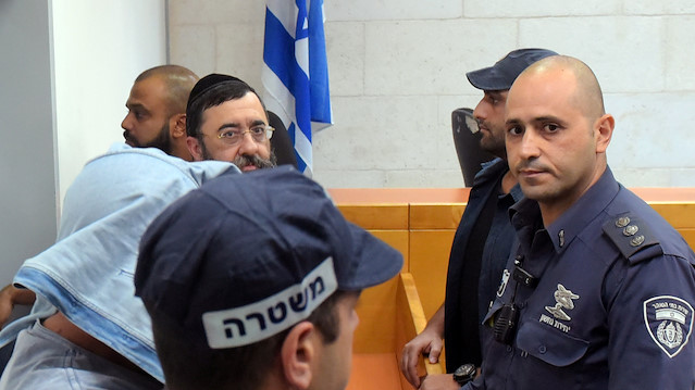 Moshe (C), brother of Israeli billionaire diamond magnate Lev Leviev appears at the Magistrates Court in Rishon Lezion