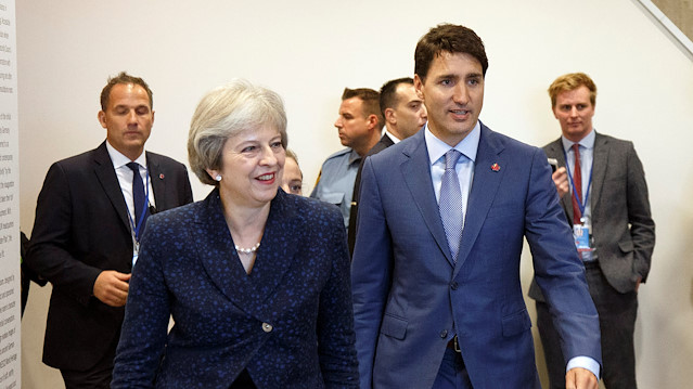 British Prime Minister Theresa May and Canadian Prime Minister Justin Trudeau 