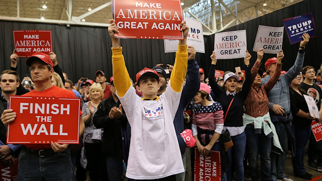 Supporters of U.S. President Donald Trump cheer at his rally in support of Ohio Republican candidates on the eve of the U.S. midterm election in Cleveland, Ohio, U.S. November 5, 2018. 