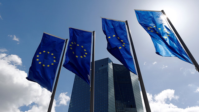  European Union flags flutter outside the European Central Bank headquarters in Frankfurt, Germany, April 26, 2018. 