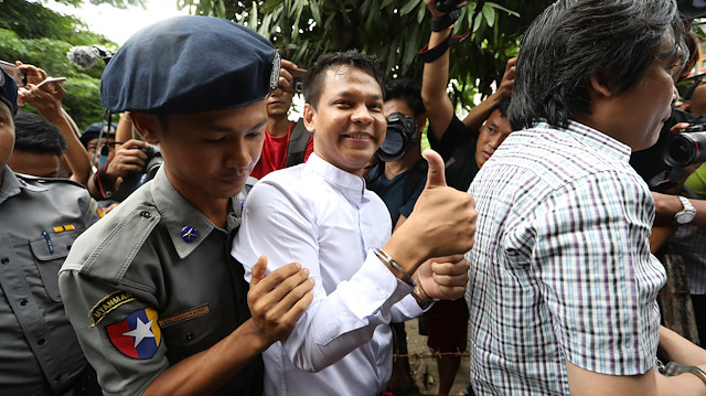 Phyo Wai Win, a reporter at Eleven Media arrives after being detained at Tamwe court in Yangon, Myanmar, October 10, 2018. 
