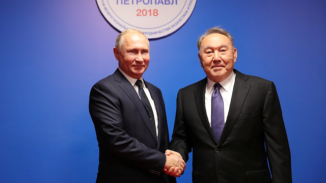 Russian President Vladimir Putin and his Kazakh counterpart Nursultan Nazarbayev shake hands during a meeting in Petropavlovsk, Kazakhstan November 9, 2018. 