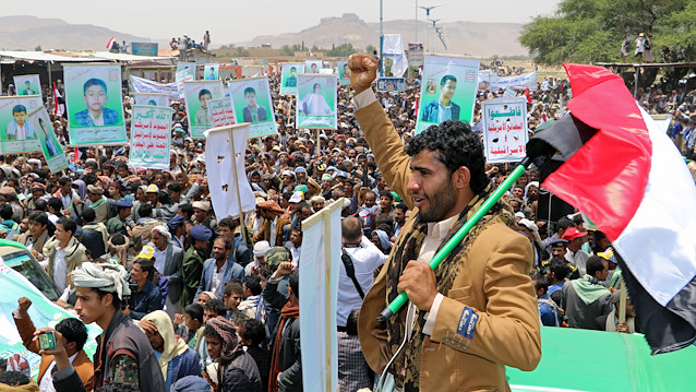 Mourners attend the funeral of people, mainly children, killed in a Saudi-led coalition air strike on a bus in northern Yemen, in Saada, Yemen August 13, 2018