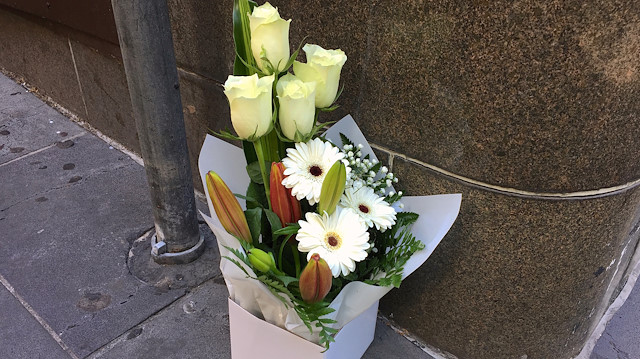 A box of flowers is seen at the site a day after where a man killed one person in what authorities said was a terrorist attack, near the Bourke Street mall in central Melbourne, Australia, November 10, 2018. 