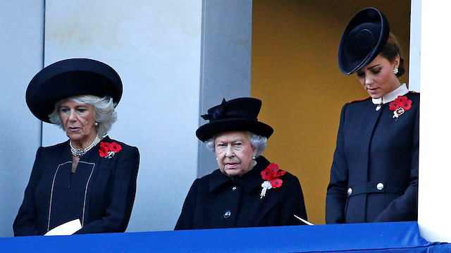 Britain's Queen Elizabeth, Camilla, the Duchess of Cornwall, and Catherine, the Duchess of Cambridge stand in silence during a National Service of Remembrance at The Cenotaph in Westminster, London, Britain, November, 11, 2018.