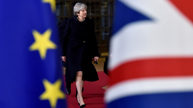 British Prime Minister Theresa May arrives for the EU summit in Brussels, Belgium.