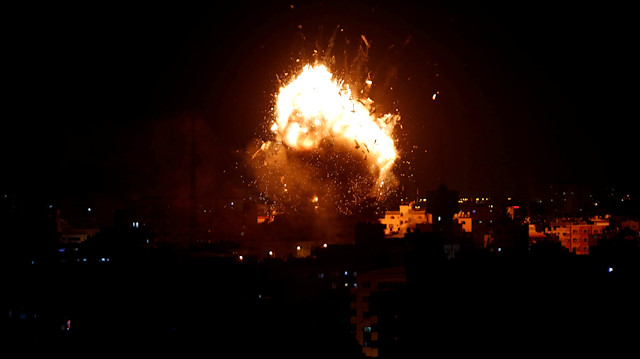 An explosion is seen during an Israeli air strike