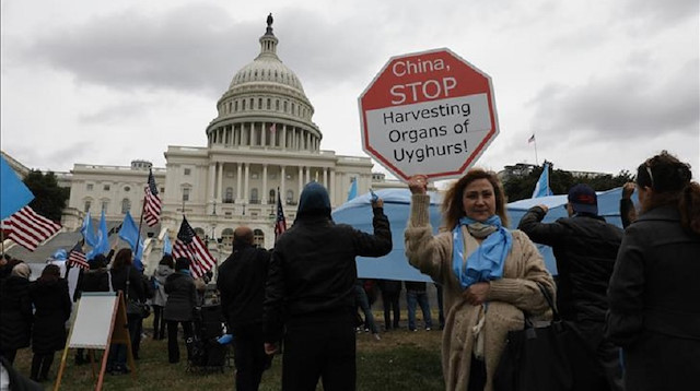  Uyghurs demonstrate against China outside of the U.S. Capitol Building in Washington, United States on November 13, 2018. Protesters took to the streets Tuesday to participate in a rally for Uyghurs and raise awareness about the occupation of East Turkestan. 