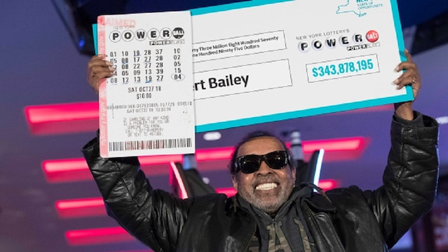 Robert Bailey holds his winning numbers