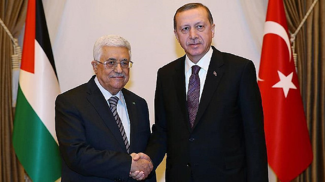 الرئيس التركي أردوغان ونظيره الفلسطيني عباس