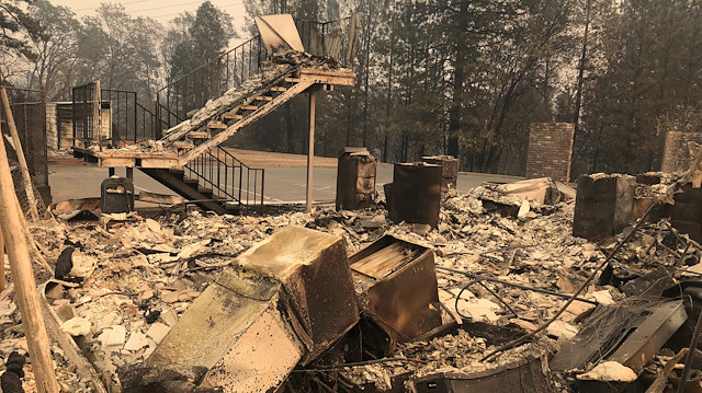 A set of stairs sit amongst ruins after wildfires devastated the area in Paradise, California, US.