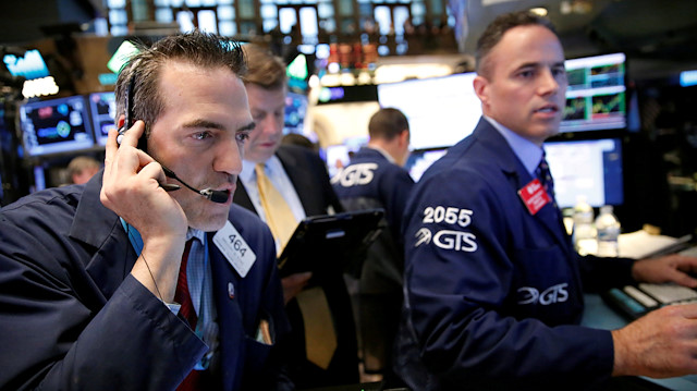 Traders work on the floor of the New York Stock Exchange (NYSE) in New York, US.