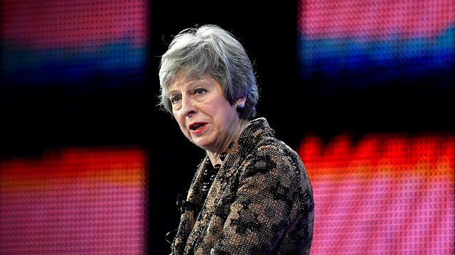 Britain's Prime Minister Theresa May replies to questions after speaking at the Confederation of British Industry's (CBI) annual conference in London, Britain.