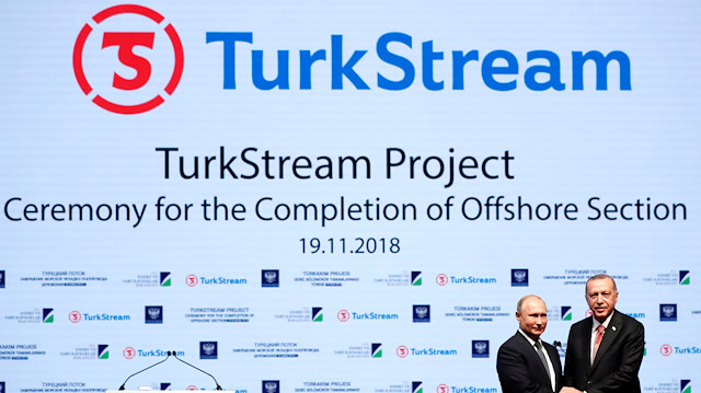 Turkish President Recep Tayyip Erdoğan and his Russian counterpart Vladimir Putin shake hands as they attend a ceremony to mark the completion of the sea part of the TurkStream gas pipeline, in Istanbul, Turkey.