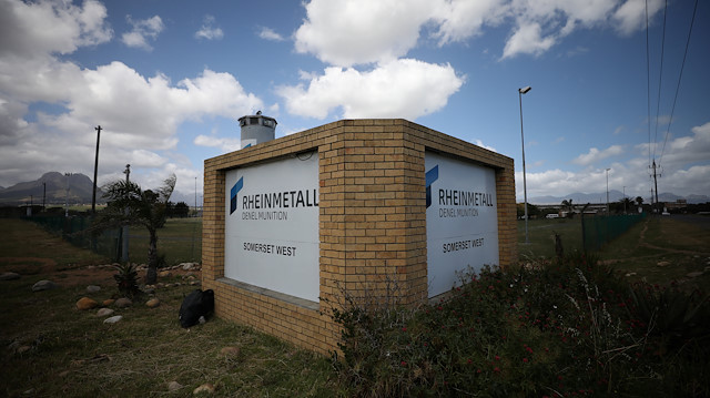 A corporate logo is seen outside the Rheinmetall Denel munitons plant near Cape Town, South Africa.