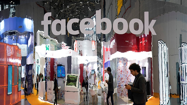 A Facebook sign at the National Exhibition and Convention Center in Shanghai, China.