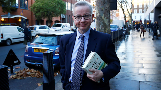Britain's Secretary of State for Environment, Food and Rural Affairs, Michael Gove leaves his office in London, Britain, November 19, 2018. 