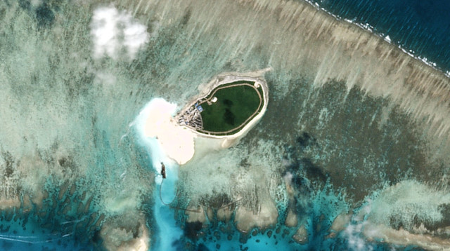 Satellite photo shows Chinese-controlled Tree Island, part of the Paracel Islands group in the South China Sea, on November 11, 2015. 