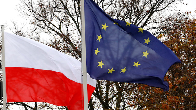 Flags of Poland and European Union flutter 