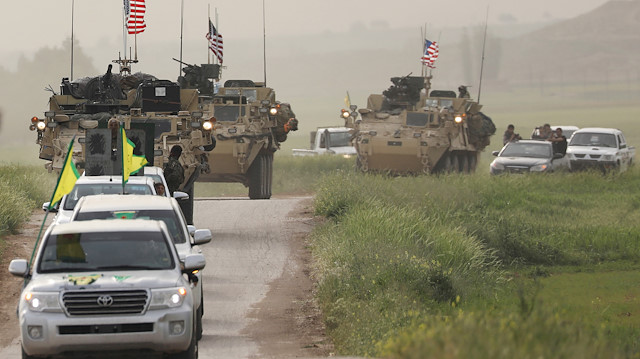 The YPG headd a convoy of U.S military vehicles in the town of Darbasiya next to the Turkish border, Syria April 28, 2017.