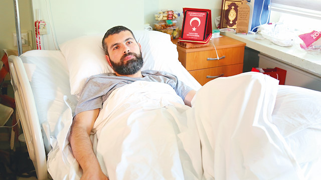 Mustafa Uygun, FETÖ’cü Yüzbaşı Mahmut Dağüstün tarafından belinden vurulduktan sonra felç kaldı.