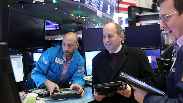 Traders work on the floor at the New York Stock Exchange (NYSE) in New York City, US.