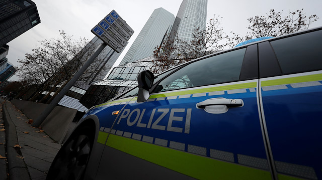 Police vehicles are parked in front of Deutsche Bank headquarters as roughly 170 criminal police officers, prosecutors and tax inspectors searched Deutsche Bank offices in and around Frankfurt, Germany, November 29, 2018, on money laundering allegations, the public prosecutor said in a statement. 