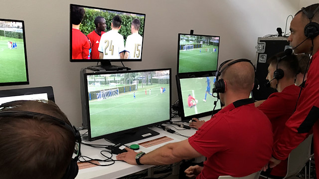File photo: Video Assistant Referees (VAR) watch a practice match as they train in the use of the technology, during a seminar for match officials organised by FIFA ahead of the World Cup in Florence