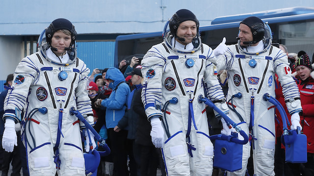 ABD'li astronot Anne McClain, Kanadalı David Saint-Jacques ve Rus kozmonot Oleg Konenenko