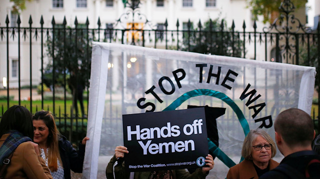 Demonstrators from the Stop The War Coalition stage the protest against the war in Yemen