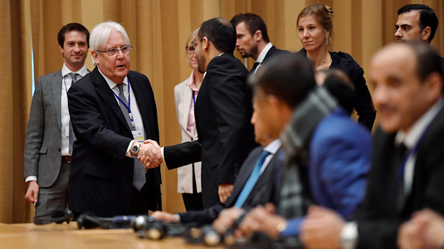 U.N. envoy to Yemen Martin Griffiths shakes hands with Yemeni delegates at the opening press conference on U.N.-sponsored peace talks for Yemen at Johannesberg castle, Stockholm, Sweden December 6, 2018. 