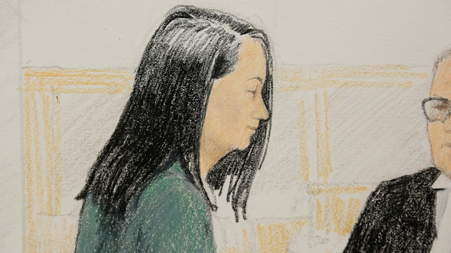 Huawei CFO Meng Wanzhou (L), who was arrested on an extradition warrant, appears at her B.C. Supreme Court bail hearing in a drawing in Vancouver, British Columbia, Canada December 10, 2018. 