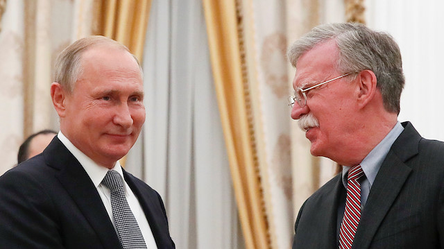 File photo: Russian President Vladimir Putin (L) greets U.S. national security adviser John Bolton during a meeting at the Kremlin in Moscow, Russia Oct. 23, 2018