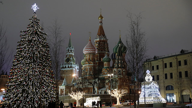 Festive decorations and illumination lights for the upcoming New Year and Christmas season are on display near the Kremlin's Spasskaya Tower and St. Basil's Cathedral in central Moscow, Russia.