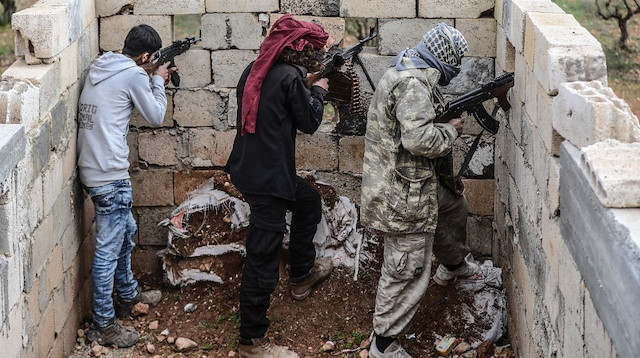 Sınırda nöbet tutan ÖSO askerleri, "Karşımızda 6 tane PYD-YPG mevzisi bulunmakta, onların her hareketini takip ediyoruz" şeklinde konuştu.