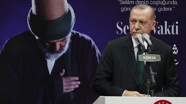 Turkish President Recep Tayyip Erdogan makes a speech during a ceremony marking the 745th death anniversary of Mevlana Jalaluddin al-Rumi in Konya, Turkey.