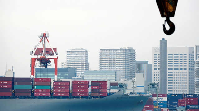 A cargo ship is pictured at an industrial port in Tokyo, Japan.