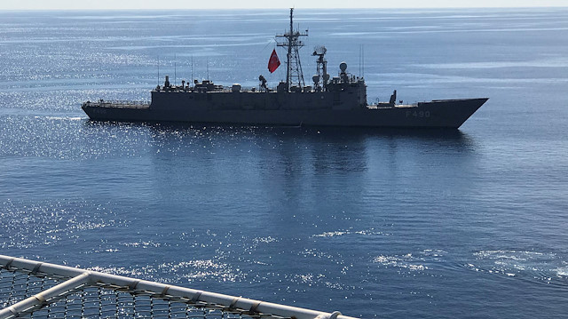 Turkish Navy frigate Gaziantep escorts drilling vessel Fatih off the Mediterranean r