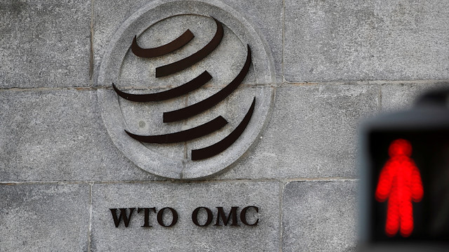 A logo is pictured outside the World Trade Organization (WTO) 