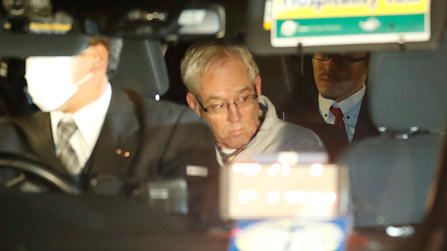 File photo: Greg Kelly, the former deputy of ousted Nissan chairman Carlos Ghosn, is seen in the car, as he leaves after being released from a detention centre in Tokyo, Japan, December 25, 2018. 