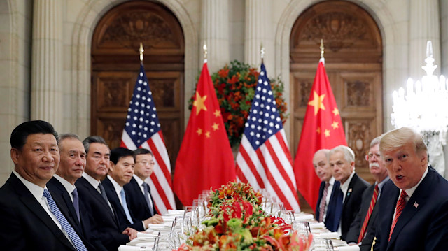 US President Donald Trump, US Secretary of State Mike Pompeo, US President Donald Trump's national security adviser John Bolton and Chinese President Xi Jinping attend a working dinner after the G20 leaders summit in Buenos Aires, Argentina.