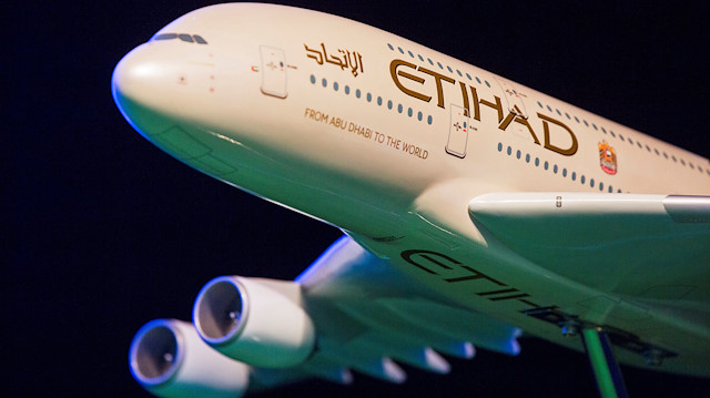 : A model Etihad Airways plane is seen at a promotional event in New York 