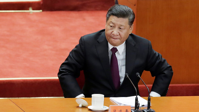 Chinese President Xi Jinping prepares to leave at the end of an event marking the 40th anniversary of China's reform and opening up at the Great Hall of the People in Beijing, China.